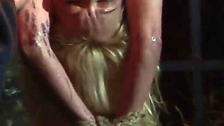 Witch Hangs Upside Down and Gets Drizzled with Black Wax