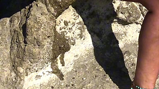 She pisses on the nudist beach