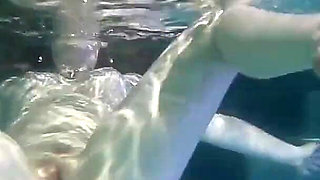 Sunny Lane sucks cock underwater