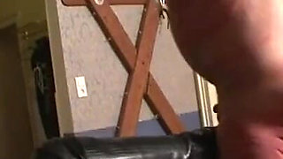 Blonde MILF humiliates masked pig