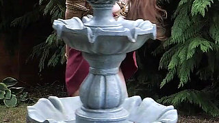 Half-stripped, Bell-jingling Slave Mila Drooling Through Tongue Clamp Is Made to Walk Outdoor Fountain Laps with Crotch Rope Saw