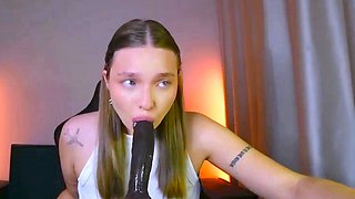 Brunette Teen Deepthroats Massive Black Dildo Live on Stream