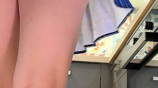 The Juggler Girl Is Here in a Long School Type Uniform Skirt to Flash Her Panties Under Her Miniskirt in the Kitchen