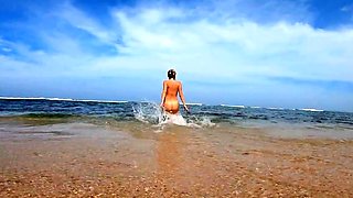 Blonde Babe's Naked Swim in the Ocean