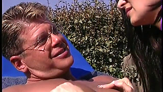Busty MILF with sunglasses check her anal elasticity outdoor