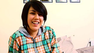 Small titted brunette Sharron with glasses masturbates