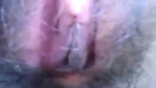 Malaysian Babe Strips Naked in the Bushes