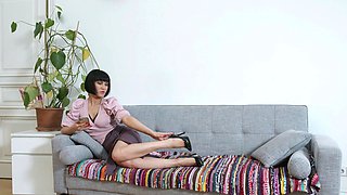 Cougar Black Kat flaunts her big booty in a skimpy skirt