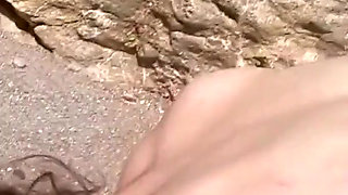 Horny Brunette Takes Ass Fucking on Beach