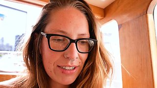Busty hairy gal with pierced nipples masturbates on yacht