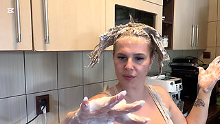 Hair Wash with Dishwasher Liquid in Kitchen Sink