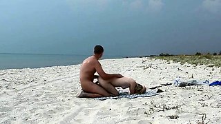 Amateur Nudist MILF Has Doggy-Style Fun at the Beach