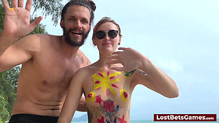 The first to bare all becomes the canvas for intimate art session