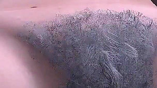 Plump Cougar Rides Dildo on the Bed