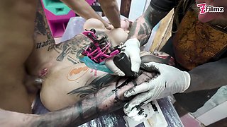 Superb Tattoo Babe Gets a New Tattoo while Having a Big Dick in her Asshole - Gaping and ATM