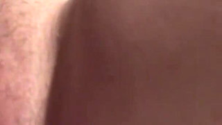 Latex Danielle in latex mask with purple dildo