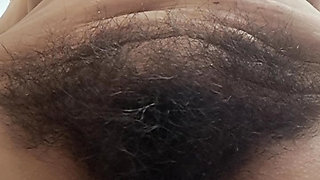 MILF with her hairy, fat pussy on display
