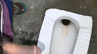 Desi Bhabhi Holding Stepbrother-in-law's Penis and Making Him Pee and Peeing Herself