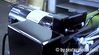 Mechatronics Technician Tests a Machine