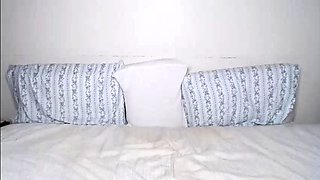 Small titted brunette Sharron with glasses masturbates