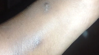 Cute plump african girl shows off her feet, black knees and light thighs for your enjoyment