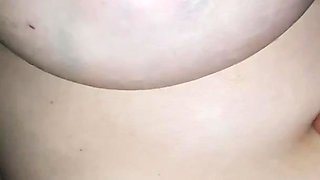 I rub her nipples and clitoris while she rides me