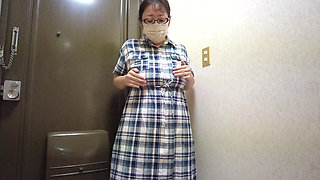 A Married Woman Masturbating Passionately in Front of the Entrance