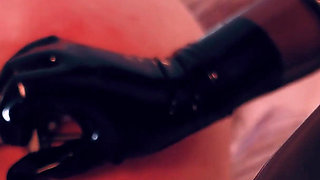 A MILF in Latex Anally Trains Her Slave, Pees on Him, Ties Him up, and Pours Wax on Him