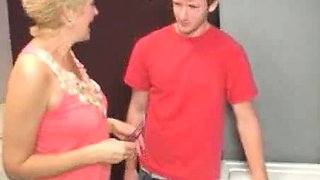Sexy mom gives a sloppy bj on young guy Joey in the laundry