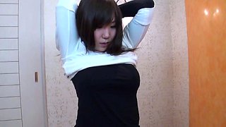 Busty brunette fingering her snatch close up