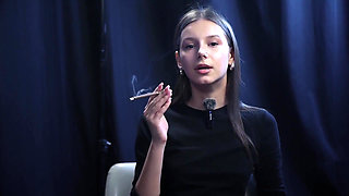 Young Girl Smoking Solo in a Calm Studio Session with Slow Exhales