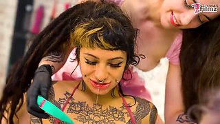Anuskatzz, Miss Medea Mortelle, and Yazmin Aziz Share Spit and Big Dildos in Double Latex Domination