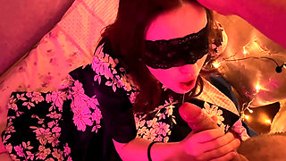 Holiday New Year blowjob from a beautiful woman in a mask and dress