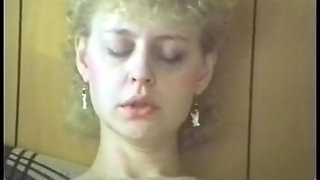 Cock-loving slut gives head while riding guy on the couch