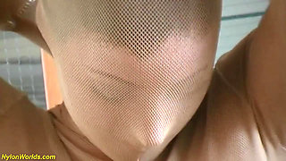 Busty flexi teen in skintight nylon catsuit shows an extreme hot striptease