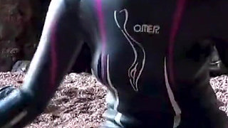 Shiny Rubber Wetsuit Tease in Private Cave