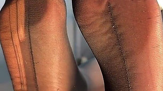 Watch Me Tease You with My Ripped Nylon Feet Through the Glass