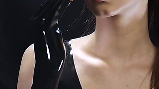 Brunette Smoking in Black Latex Outfit Slow Sensual Scene