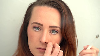 Extreme Close up Blue Eyed Redhead Smoking