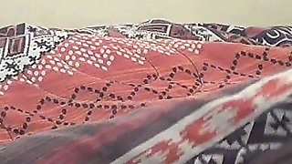 Deep Kissing While Playing with a Strange Object Under the Duvet