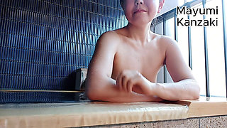 A Married Woman Taking a Bath in a Hotel Room