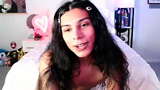 Small titted brunette Sharron with glasses masturbates