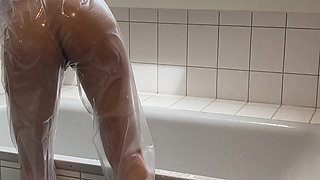 Sue, Cleaning the Bathroom in a Pvc Suit!