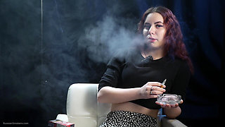 Cute Russian Redhead Smoking in Leopard Pants