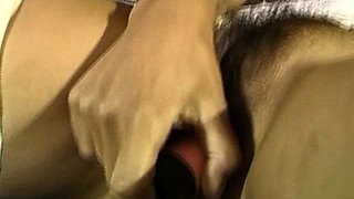 Smoking hot brunette toying tasty pussy in stockings