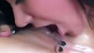 Two women enjoy some festive girly-girl fun with