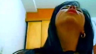 Squirting webcam babe with her cat