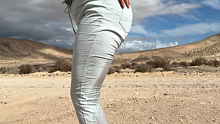 Girl can't hold pee and wet her pants on the public road