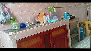 Chubby Stepmother Washes and Cleans the Kitchen