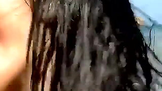 Raquel Abril a cheating whore with brown hair enjoys screaming with pleasure while fucking on a beach